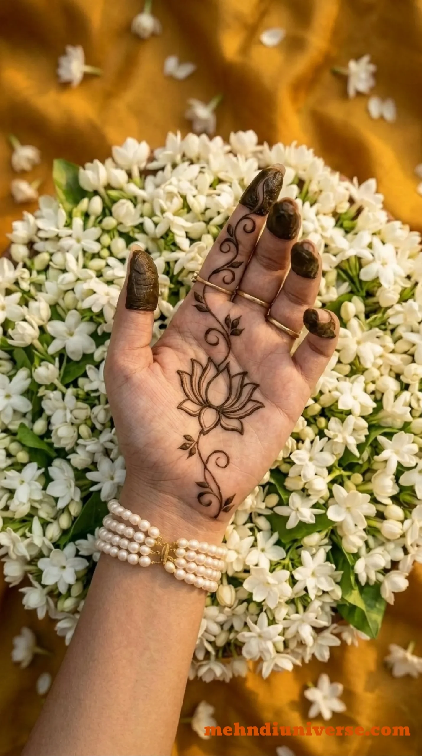 Simple mehndi design on front hand with lotus vine pattern and fingertip coating 01 v1
