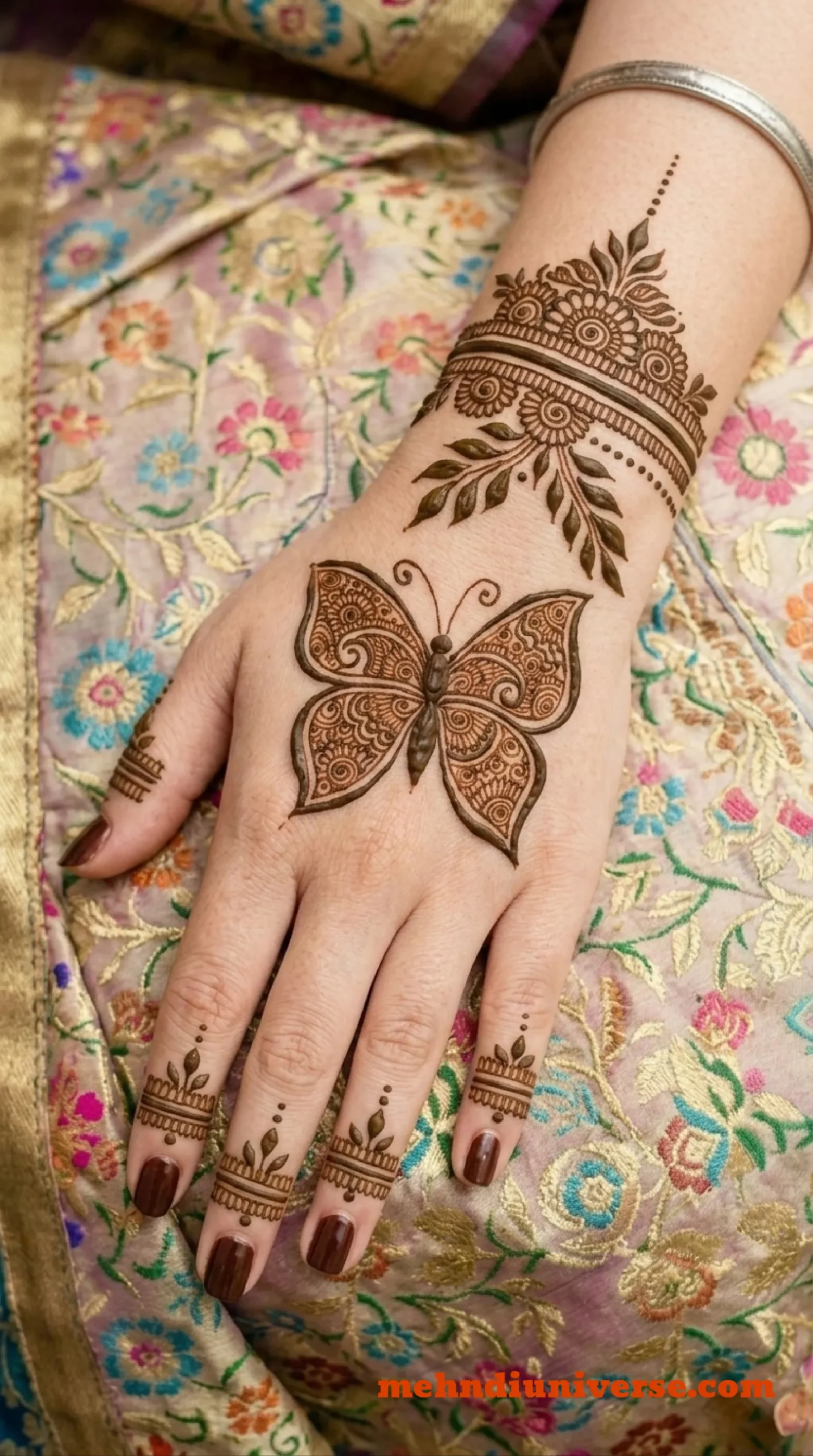 Simple majestic mehndi design with butterfly pattern on wedding back hand 11 v2