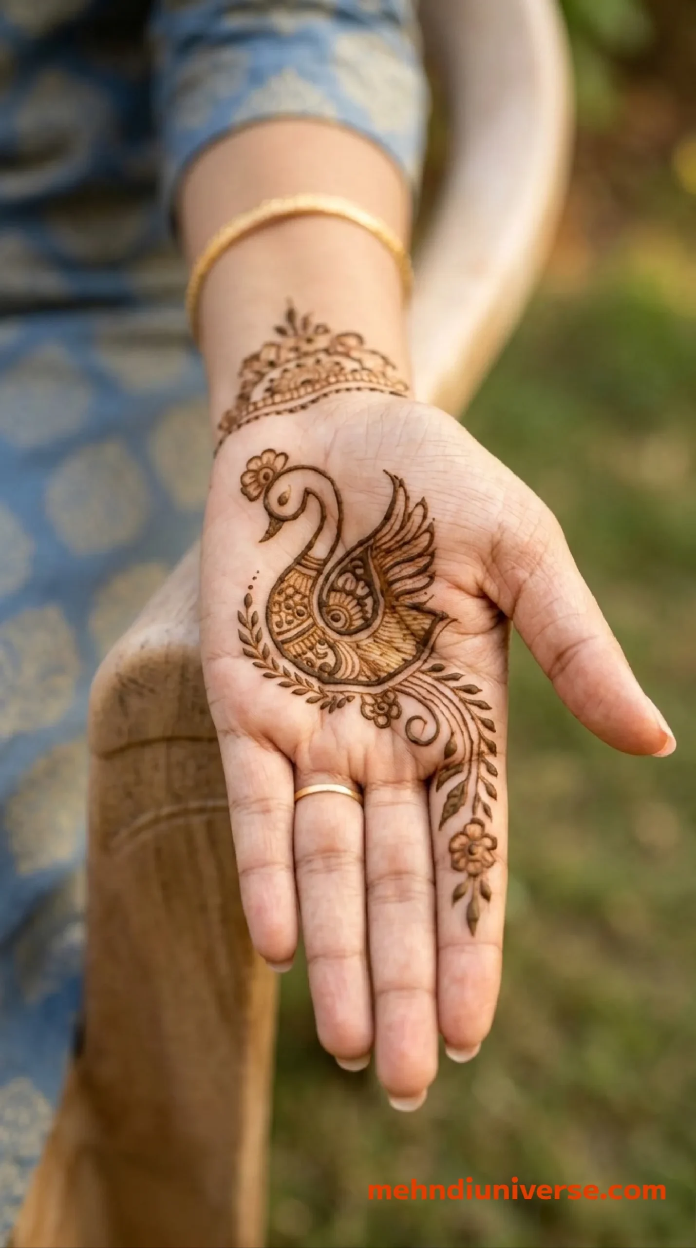 Simple elegant mehndi design with peacock pattern on wedding front hand 21 v1